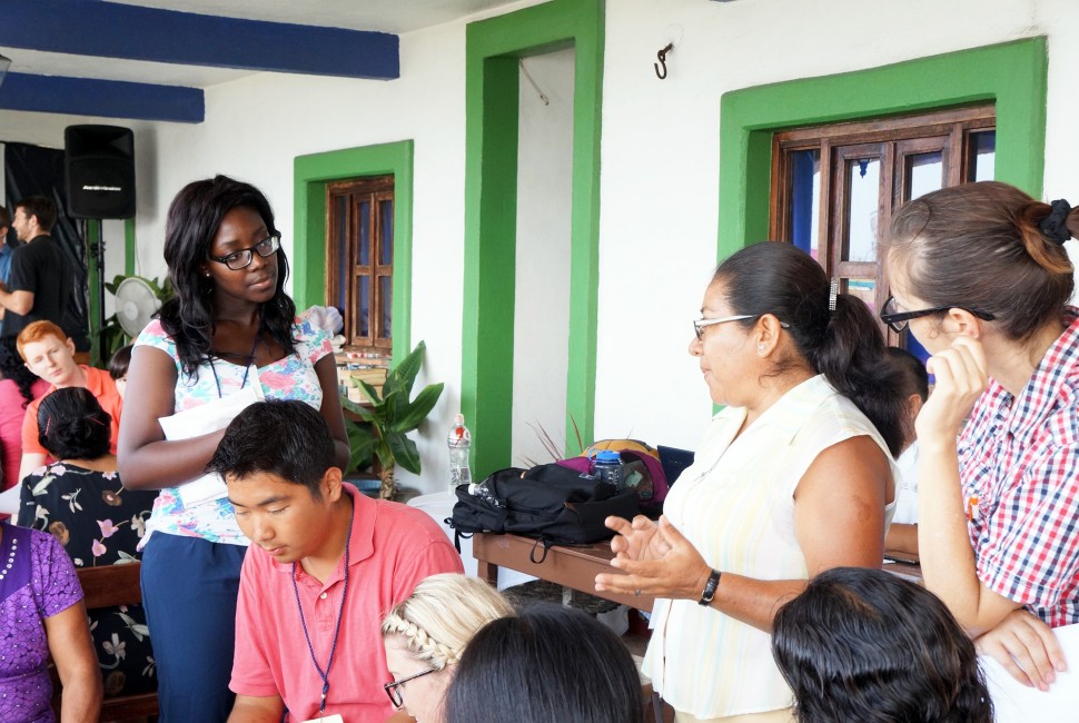 Group of people conversing 