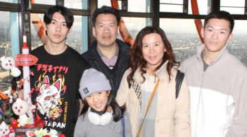 Dr. Ting (back), his wife, Flora (second from right), and their children, Wilson, Hope, and Patrick.