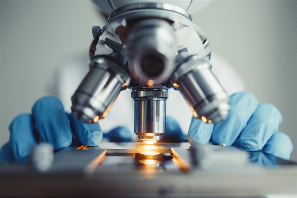 Microscope being used in a lab