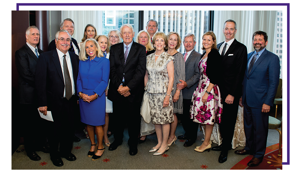 Extended members of Dr. Snorf’s family at the 2016 investiture ceremony of Michael A. Terry, MD, as the Dr. Charles and Leslie Snorf Professor of Orthopaedic Surgery at Northwestern. Back row: Lowell Snorf III, nephew; Dick Livermore, son-in-law; Cynthia Livermore, daughter; Peggy Snorf, niece; Chris Wilson, niece-in-law; Susan Snorf Lansbury, daughter; Jim Lansbury, son-in-law; Phoebe Foltz Lenhard, niece; John Lenhard, nephew-in-law; Erica Van Baalen, stepdaughter-in-law; David Hicks, stepson; Kevin Hicks, stepson. Front row: Bob Zengeler; Terry Foltz Zengeler, niece; Charlie Snorf; Leslie Snorf.