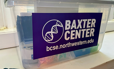 Container with Baxter Center logo on it